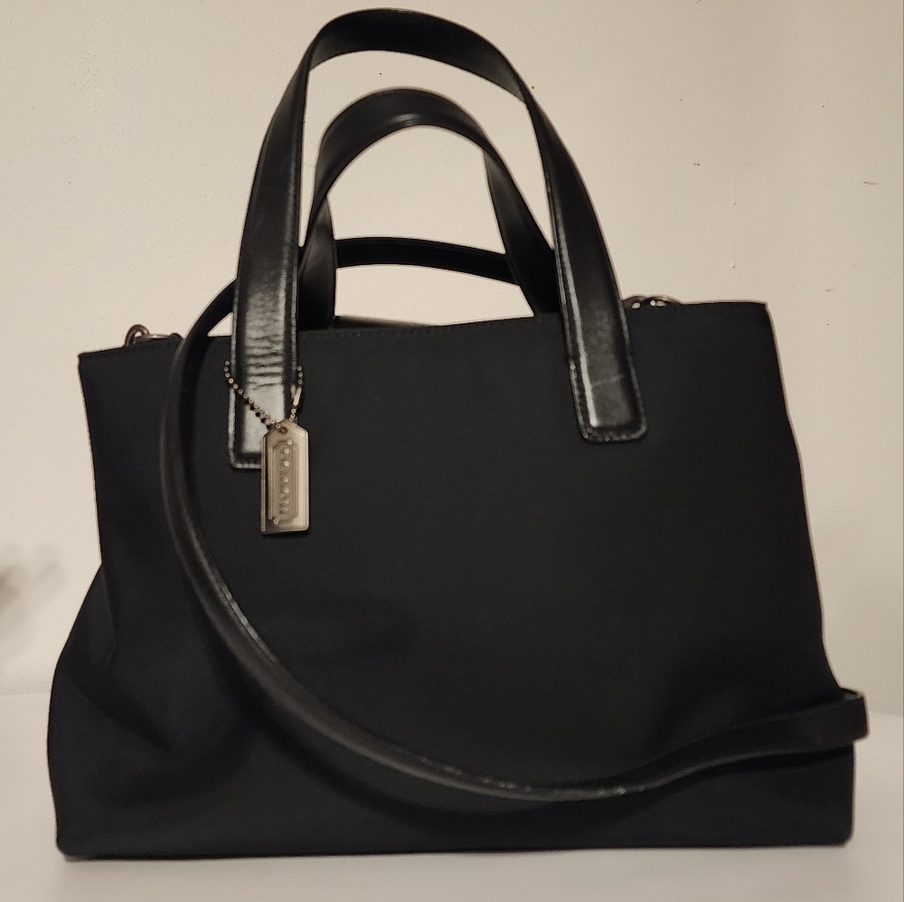 Coach Black Tote with Durable Fabric and Metallic Closure
